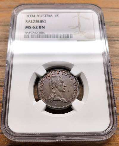 凡希社世界钱币微拍第三百二十二期 - 1804奥地利萨尔茨堡主教斐迪南三世1克鲁泽铜币NGC-MS62，1804年是萨尔茨堡世俗化后首批奥地利管辖的铸币年份，比1803年大主教时期铸币存世量更少。
