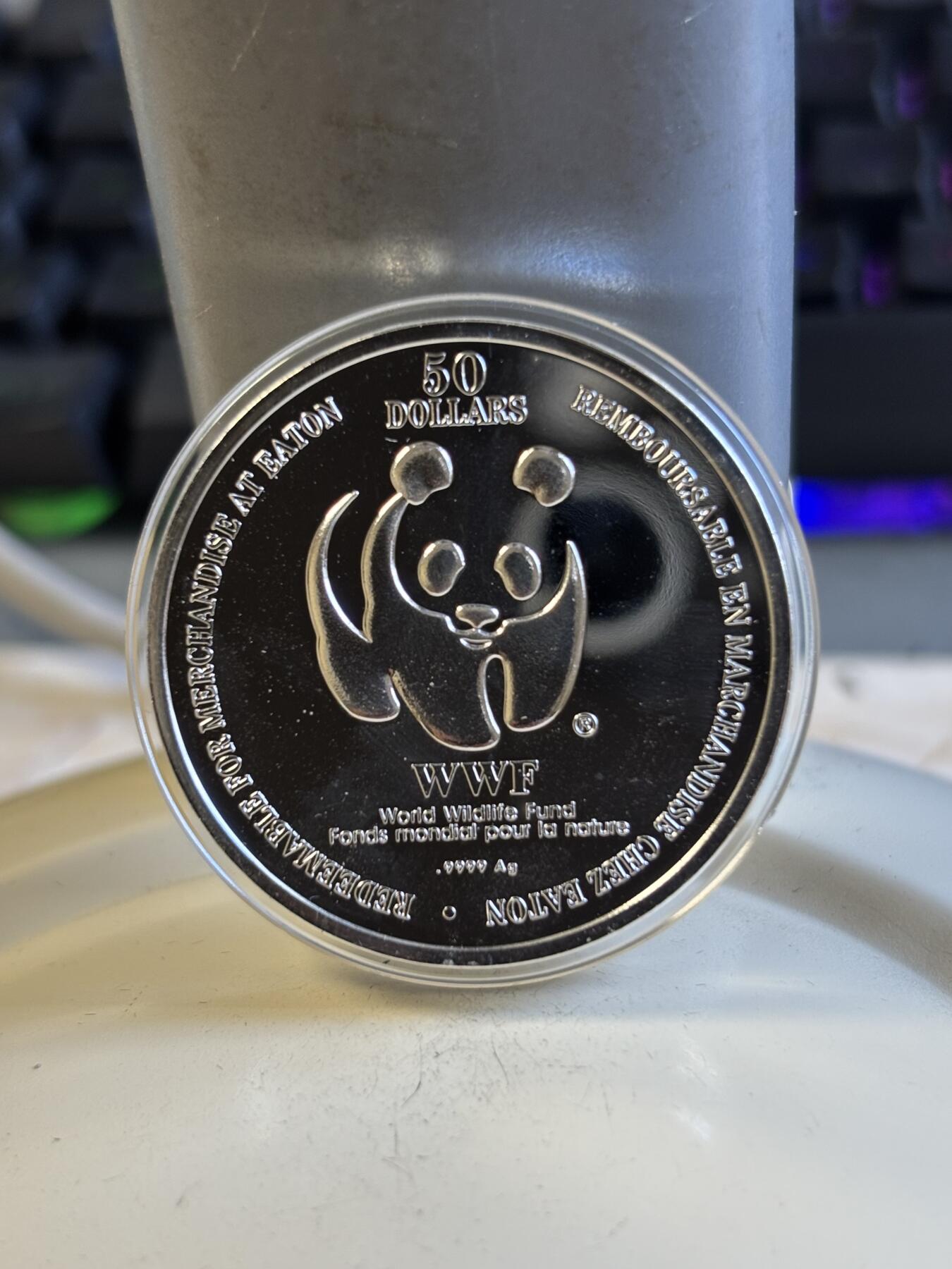 第197期拍卖 加拿大1995年世界自然基金会1盎司纪念银币带盒证书，9999银，有氧化，银价584