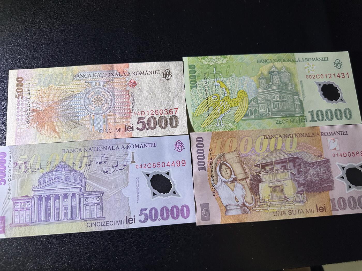 《外钞收藏家》第六百二十六期（精品场）（长期征集拍品、欢迎藏友们联系合作） 罗马尼亚1998-2001年5000纸钞+1万/5万/10万塑料钞列伊4张老版大面额	UNC