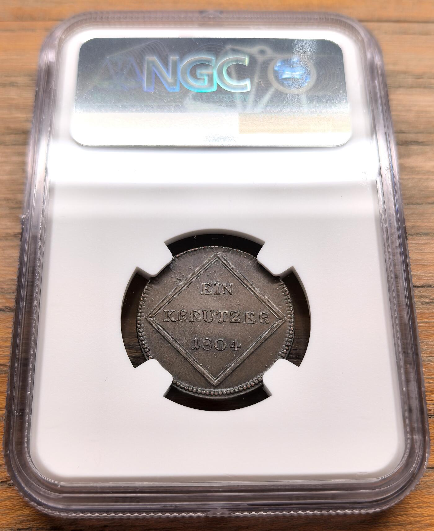 凡希社世界钱币微拍第三百二十二期 1804奥地利萨尔茨堡主教斐迪南三世1克鲁泽铜币NGC-MS62，1804年是萨尔茨堡世俗化后首批奥地利管辖的铸币年份，比1803年大主教时期铸币存世量更少。