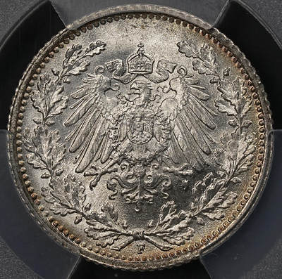 修遠堂世界钱币第111期 - PCGS MS66 1915年德国1/2马克银币，F厂铭，同一原卷头一次送评级都是67-68，这次送惨被压分，这枚绝不止66的状态，环彩