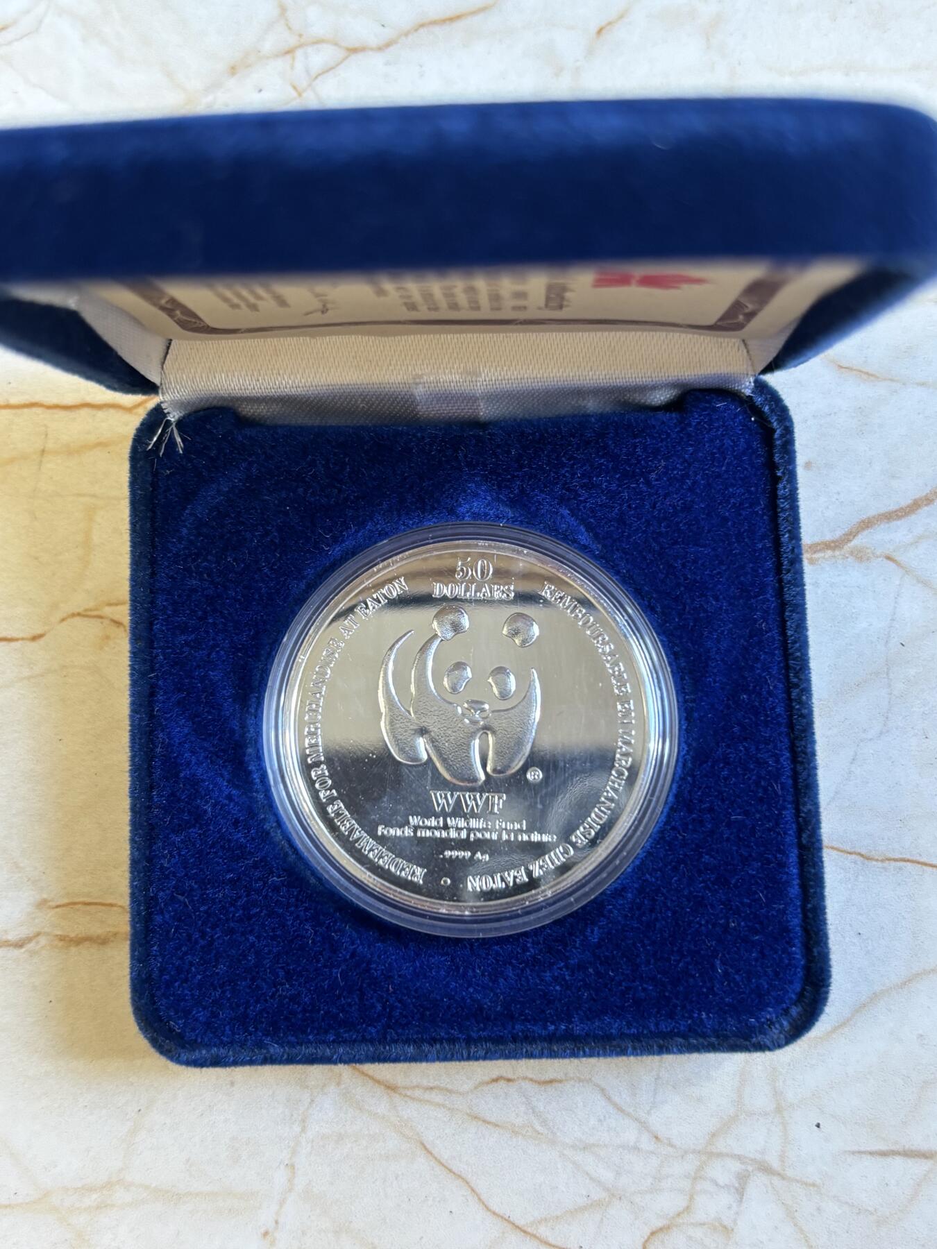 第197期拍卖 加拿大1995年世界自然基金会1盎司纪念银币带盒证书，9999银，有氧化，银价584