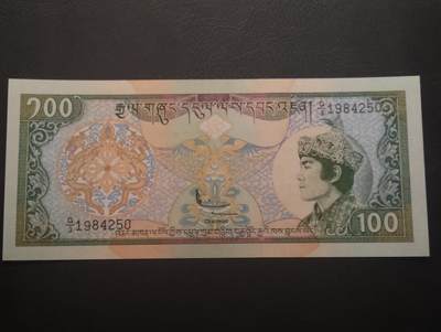 2026四月第二期，总第223期 - 不丹1994版100努尔特鲁姆UNC 旺楚克国王和特鲁隆宗的王宫