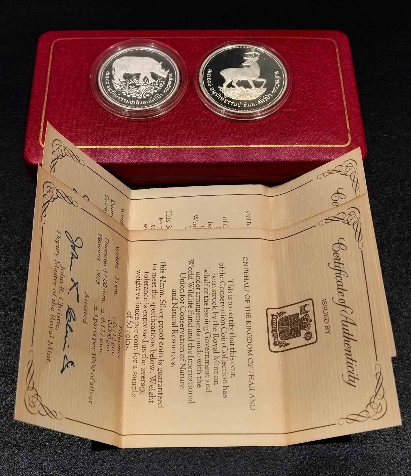 凡希社世界钱币微拍第三百二十二期 1976泰国珍稀动物两枚套PS，原盒证书，币面略有轻微氧化斑点。