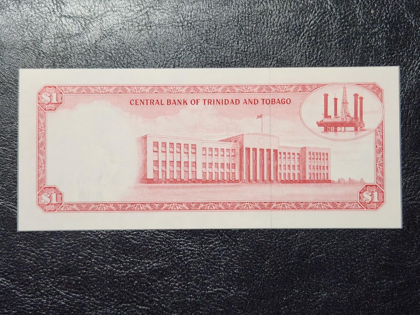 4月11号晚上8点 中外纸币自动截拍第55场 特立尼达和多巴哥 1元 纸币  1977飞鹤版 签名4 全新 