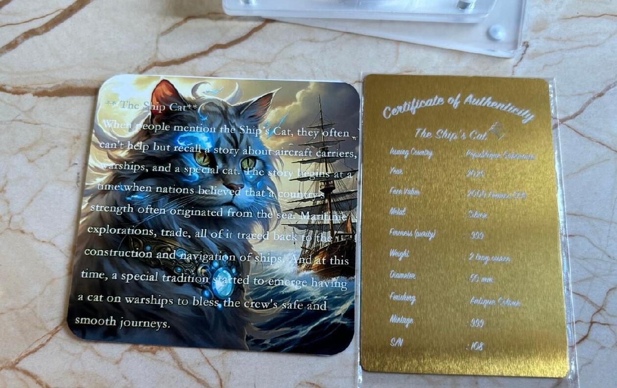 昊象达收藏银币拍卖第9场 加蓬2025年The Ship's Cat猫银币，999银，2盎司，50mm，古钱币色，带原装盒子和证书，保存很新，包装齐全