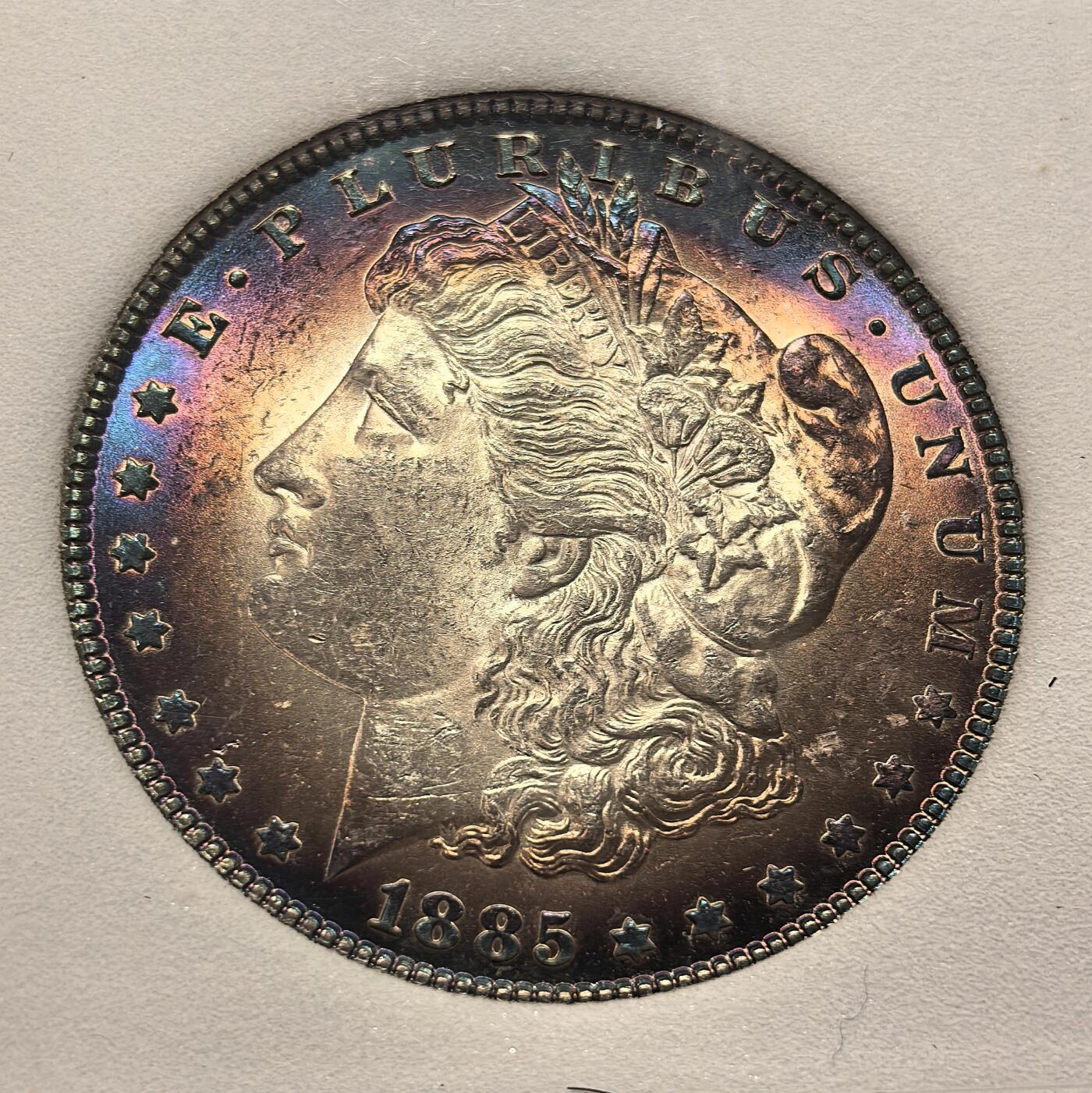 博洋堂世界钱币拍卖第168期（全场包邮） NNC MS65 美国1885年摩根银币，正面女神自然过渡的炫彩包浆，品相顶级，霸道十足