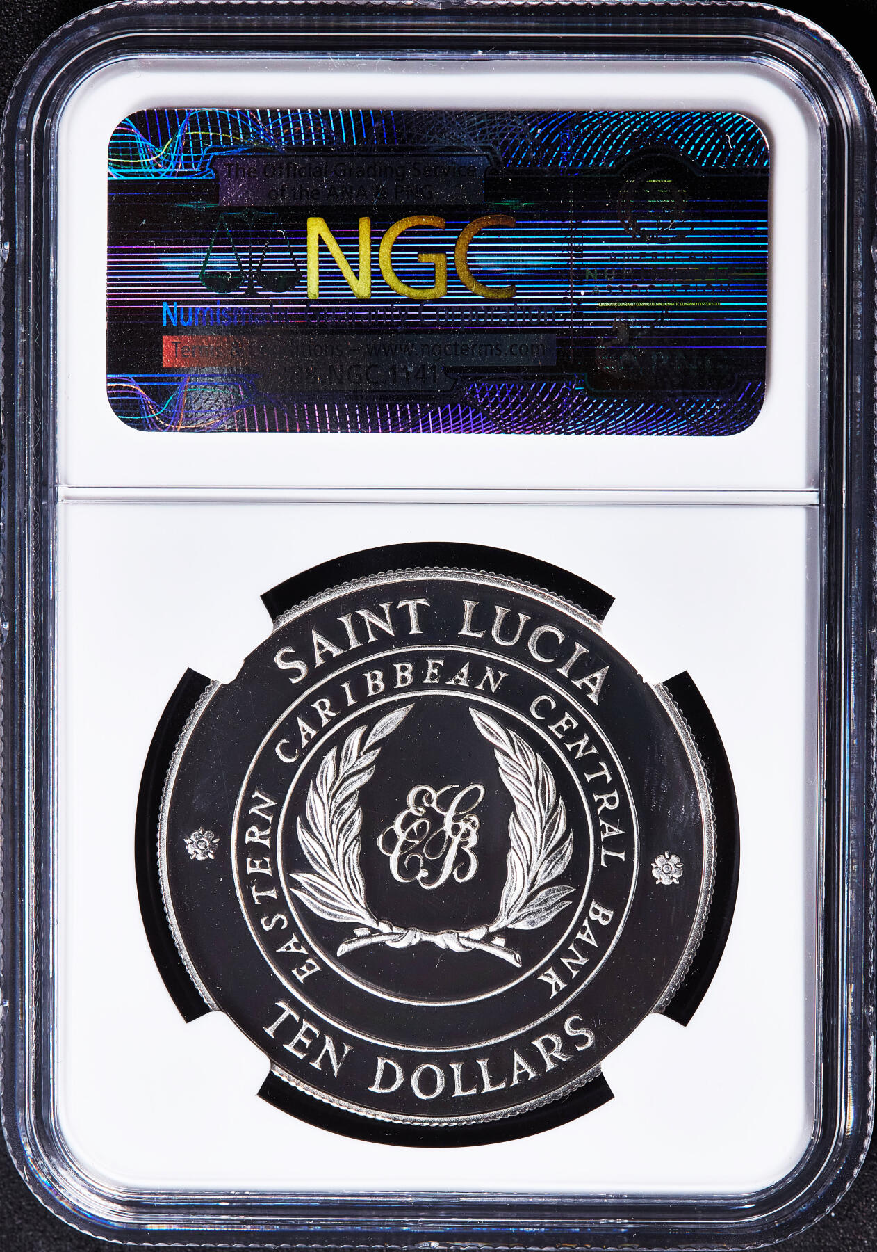 【俄甄集藏】满园春色-2026年(051)04-22星期三 晚 19:30 全场包邮 圣卢西亚1986年纪念英联邦财政部长会议召开10元皮通山海岸风光精制大银币，NGC PF69UC，重28.28克，925银，发行量1000枚，稀有品种，冠军分