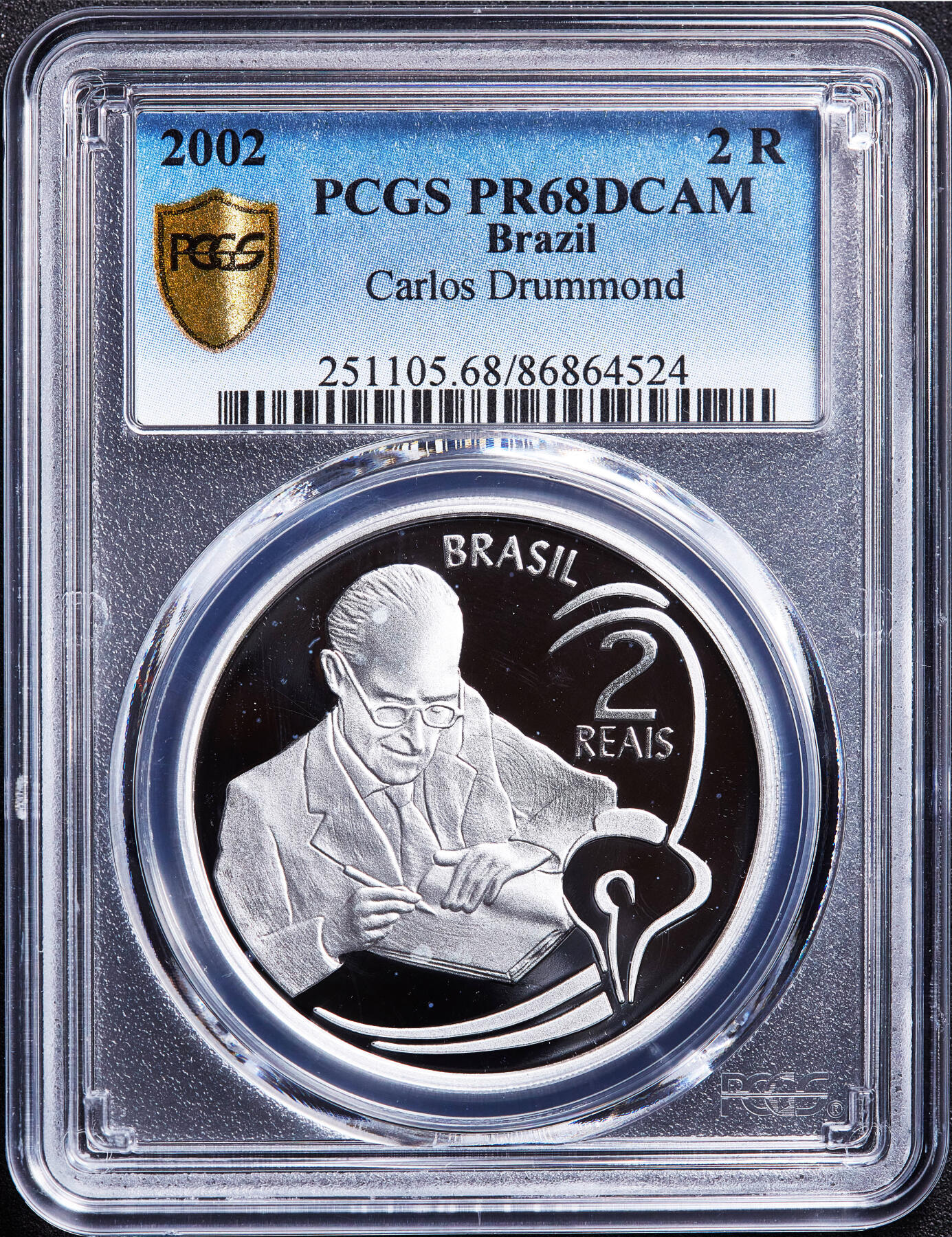 【俄甄集藏】满园春色-2026年(051)04-22星期三 晚 19:30 全场包邮 巴西2002年纪念诗人卡洛斯·德拉蒙·德安德拉德诞辰100周年2瑞斯精制大银币，PGGS PR68DC，重28克，999银，发行量6999枚，少见品种，季军