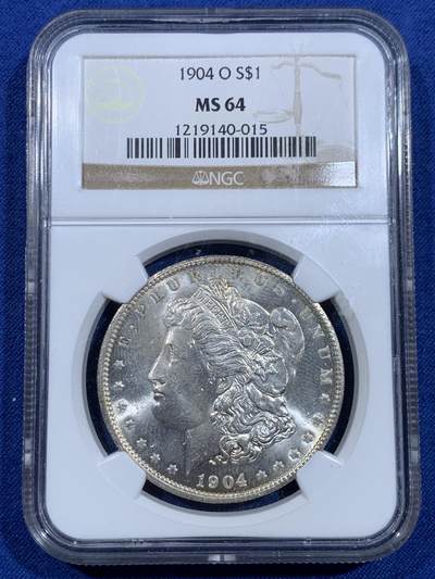 《竞宝斋》第479场 周日，周一 2场连拍 （全场包邮）20级店铺 欢迎送拍 - NGC MS64 美国1904年O版摩根银币，老盒严评，PL质感，淡彩