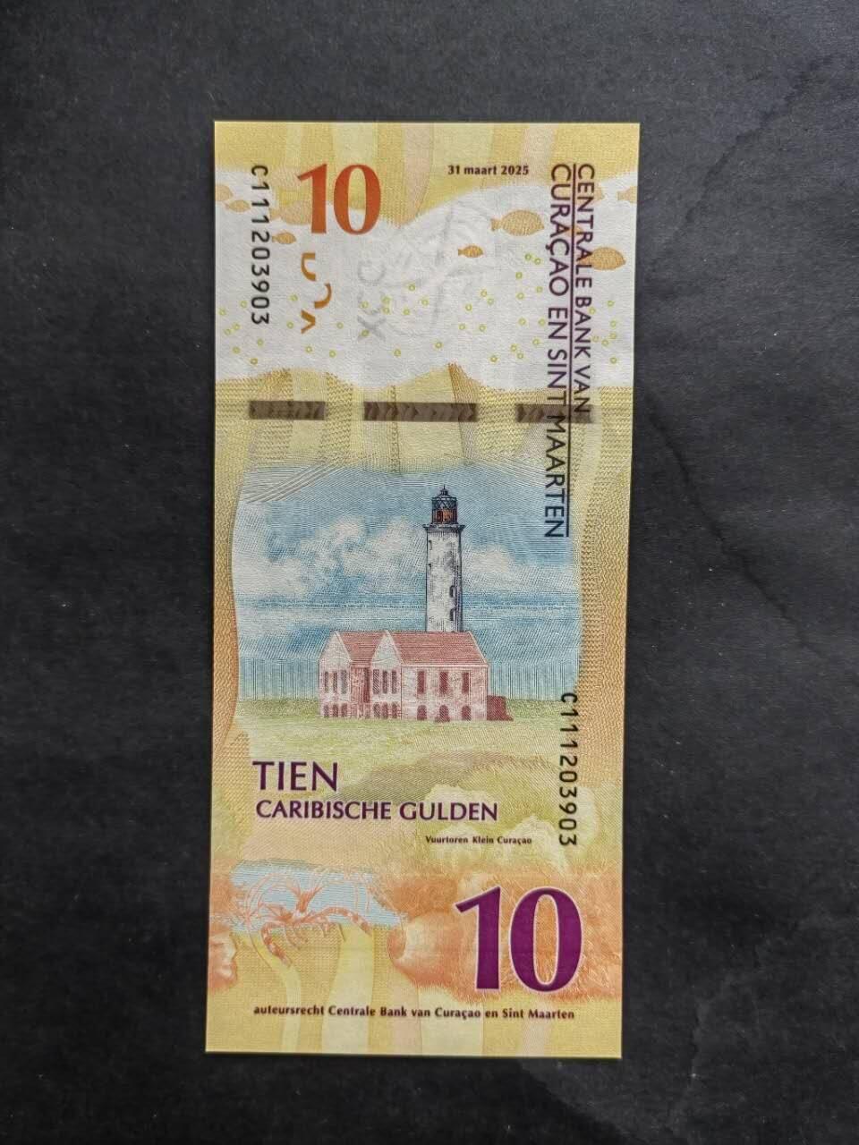 外国纸币专场260418场 库拉索和圣马丁10盾，全新品相UNC。