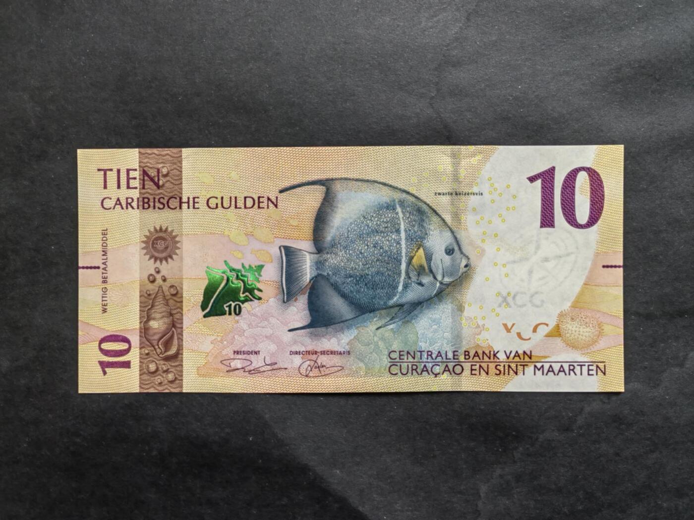 外国纸币专场260418场 库拉索和圣马丁10盾，全新品相UNC。