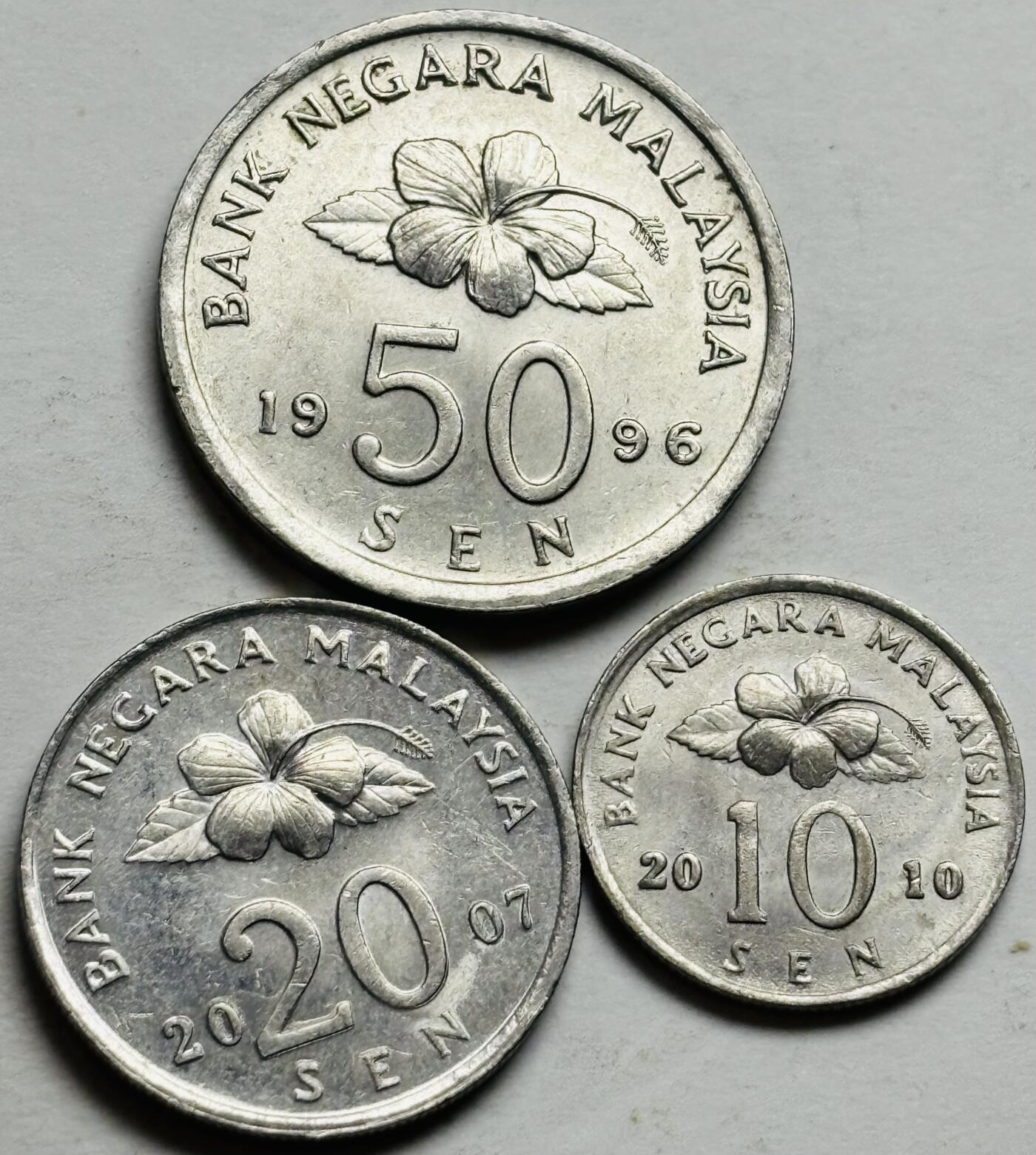 文馨钱币收藏第 300 场，银币，散币，小量德占比利时时期货币，长期接代拍业务 原光好品马来西亚民俗版 10-50 仙 3 枚套