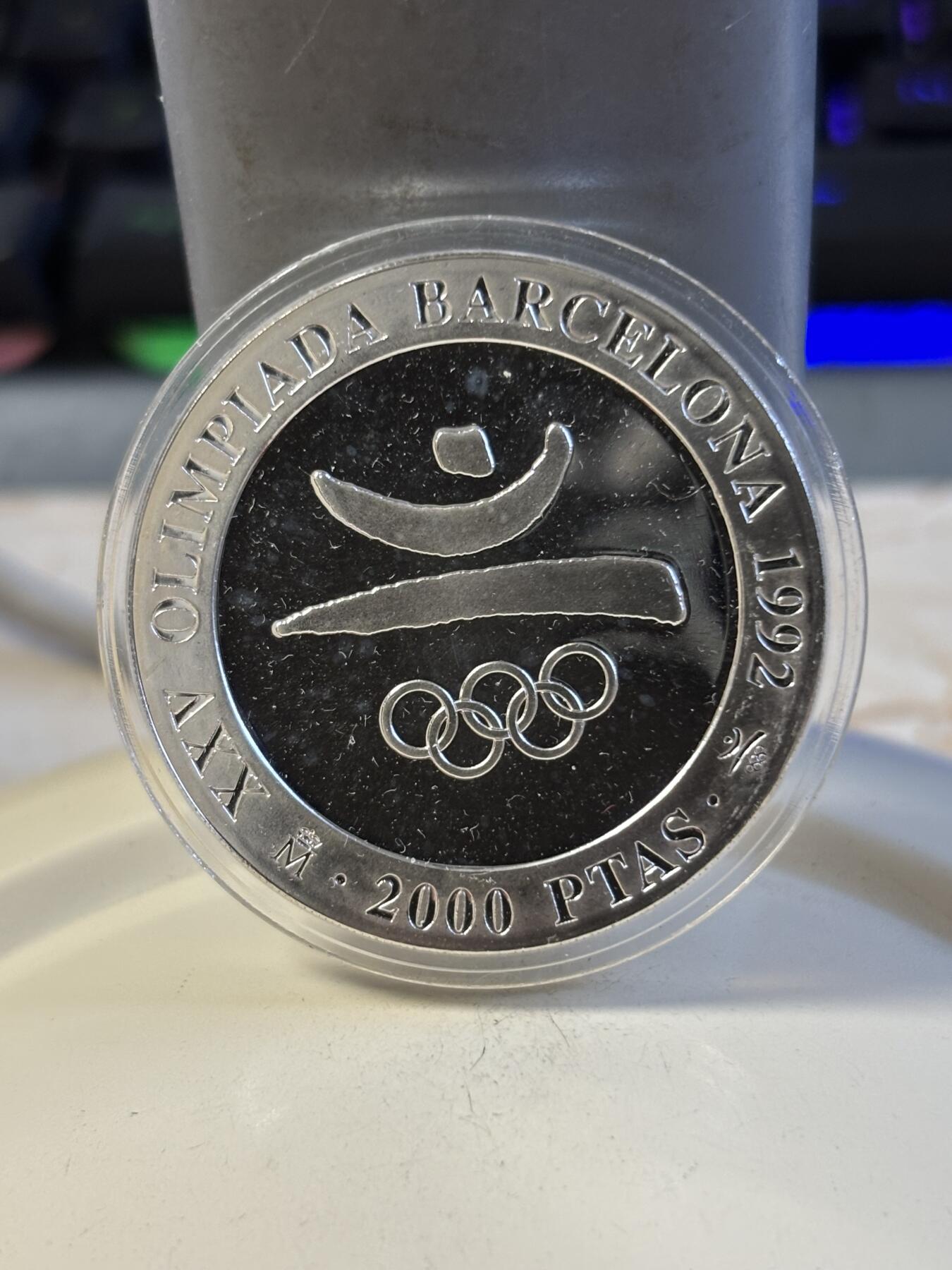 第197期拍卖 西班牙1990年2000比塞塔精制银币 巴塞罗那奥运会系列-会标 27克925银 原盒，有瑕疵