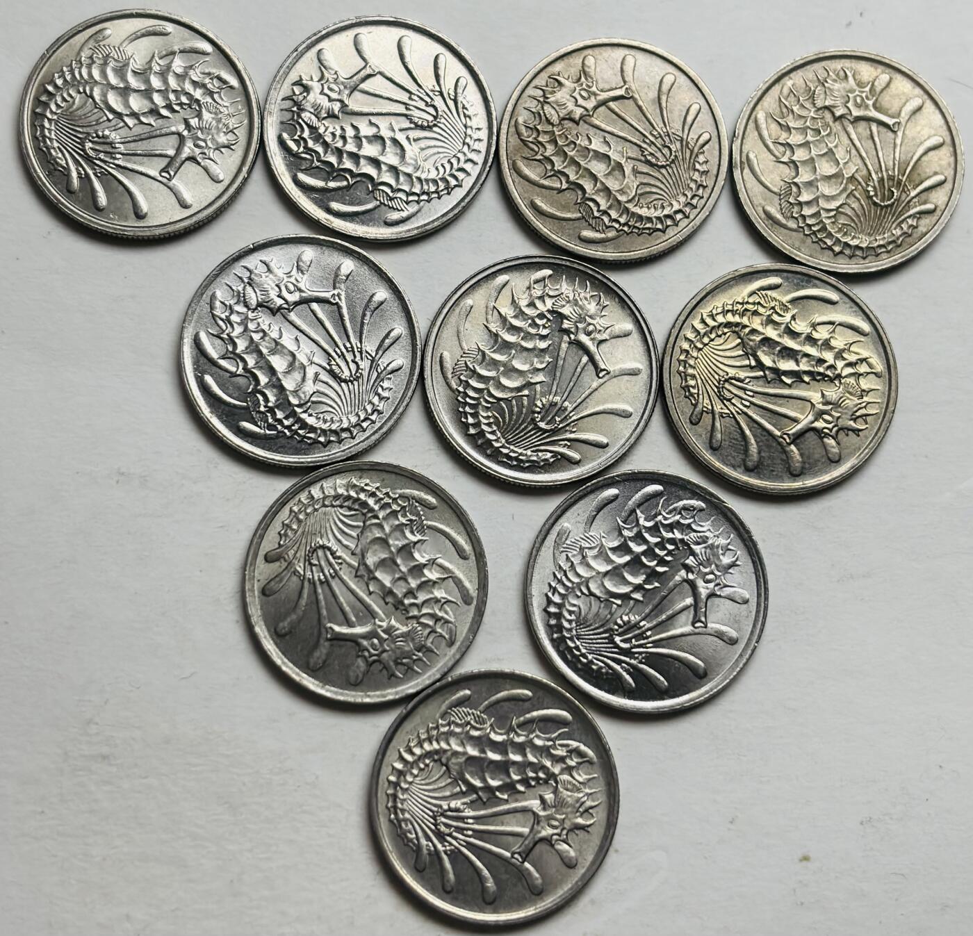 文馨钱币收藏第 300 场，银币，散币，小量德占比利时时期货币，长期接代拍业务 全新新加坡老版 10 分海马版 10 个年份无重复