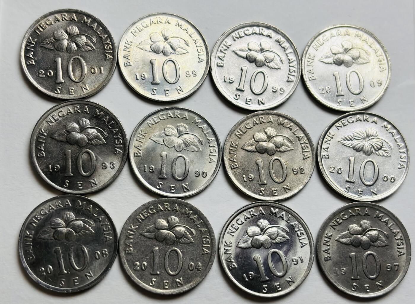 文馨钱币收藏第 300 场，银币，散币，小量德占比利时时期货币，长期接代拍业务 全新马来西亚民俗版 10 仙 12 个年份不重复