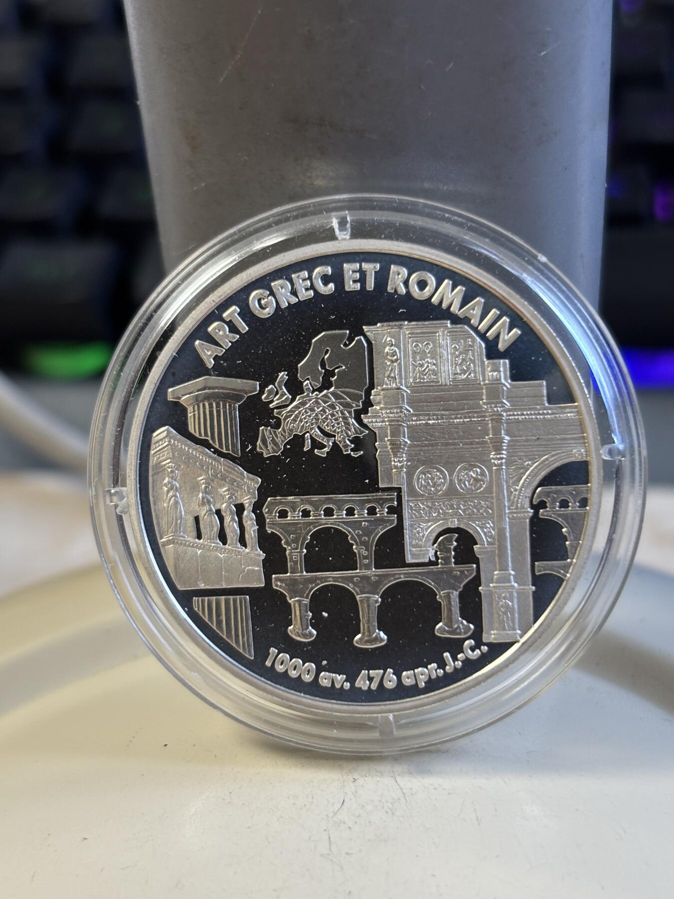 第197期拍卖 法国1999年6.55957法郎精制银币 罗马和希腊艺术 22.2克900银 发行量：1万5千 盒证全