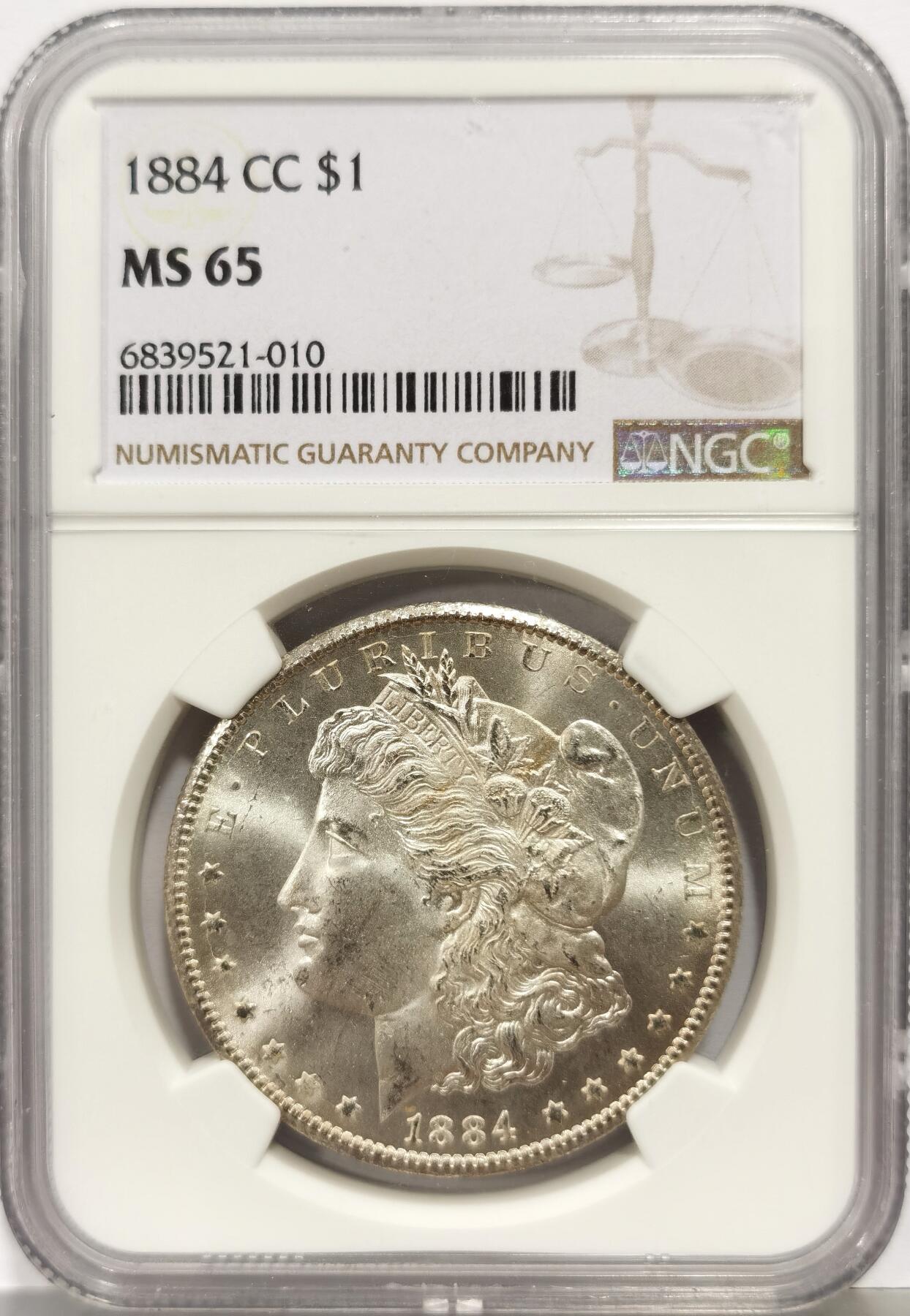 博洋堂世界钱币拍卖第168期（全场包邮） NGC MS65 美国1884 CC 摩根 稀有卡森厂 十字转光 币面细腻如糖霜