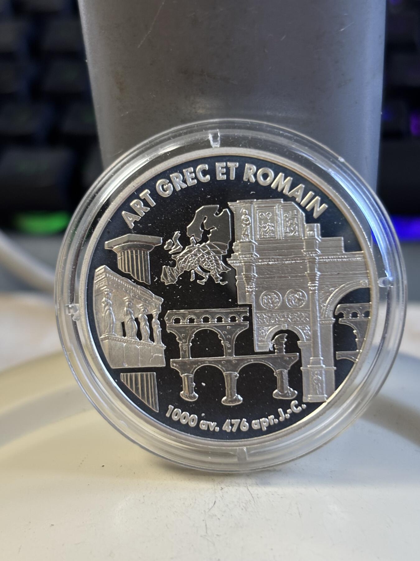 第197期拍卖 法国1999年6.55957法郎精制银币 罗马和希腊艺术 22.2克900银 发行量：1万5千 盒证全