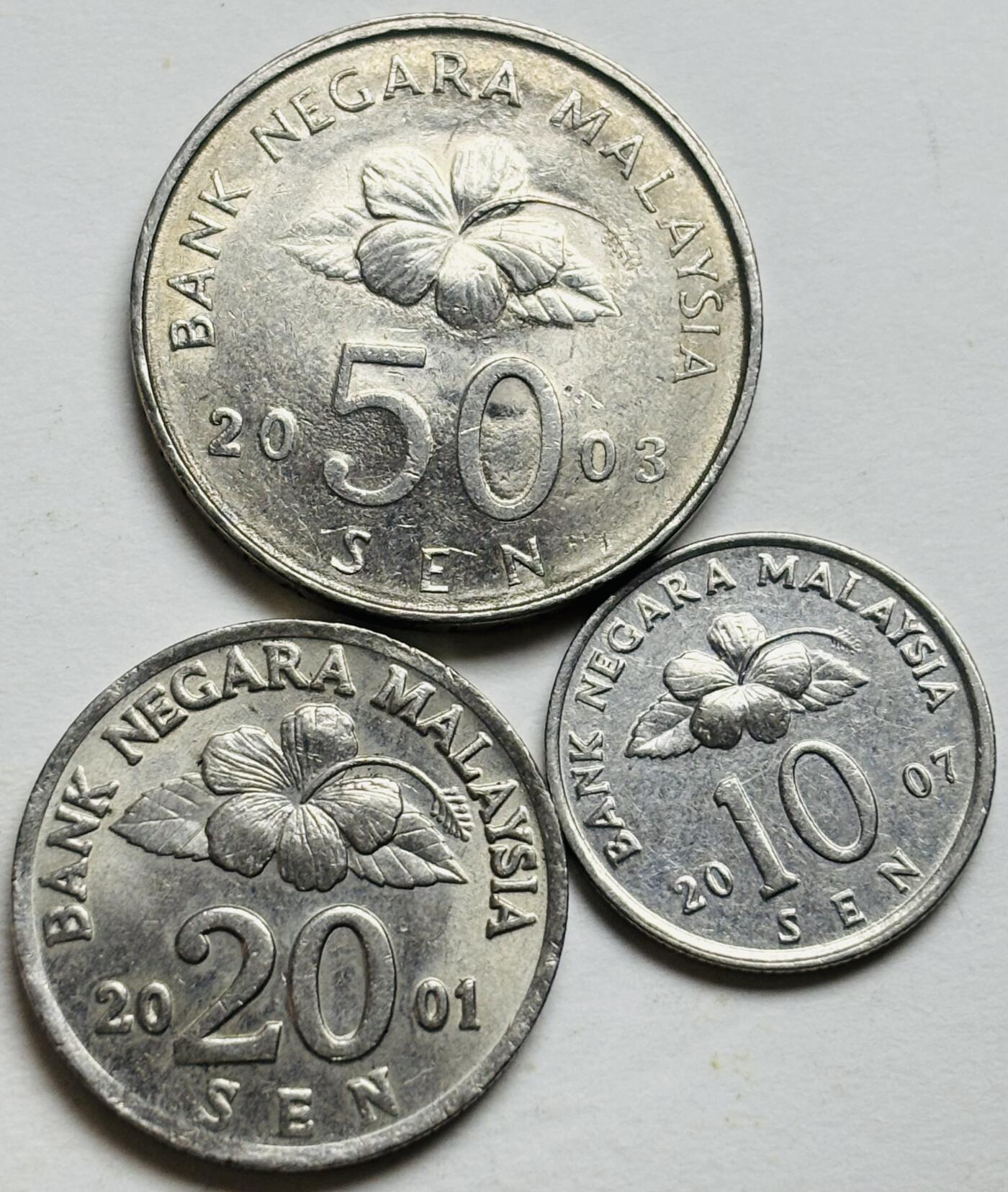 文馨钱币收藏第 300 场，银币，散币，小量德占比利时时期货币，长期接代拍业务 好品马来西亚民俗版 10-50 仙 3 枚套