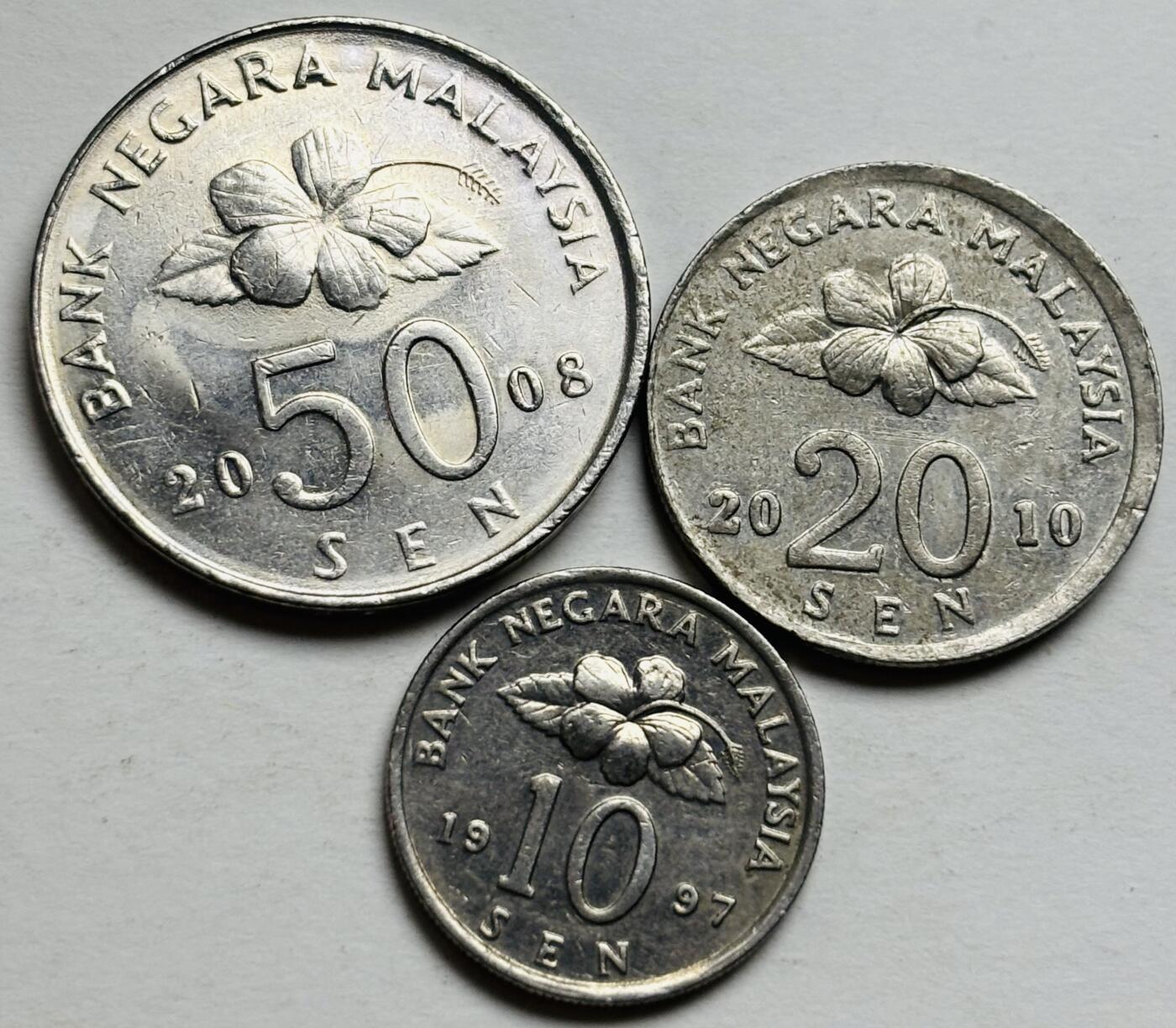 文馨钱币收藏第 300 场，银币，散币，小量德占比利时时期货币，长期接代拍业务 好品马来西亚民俗版 10-50 仙 3 枚套