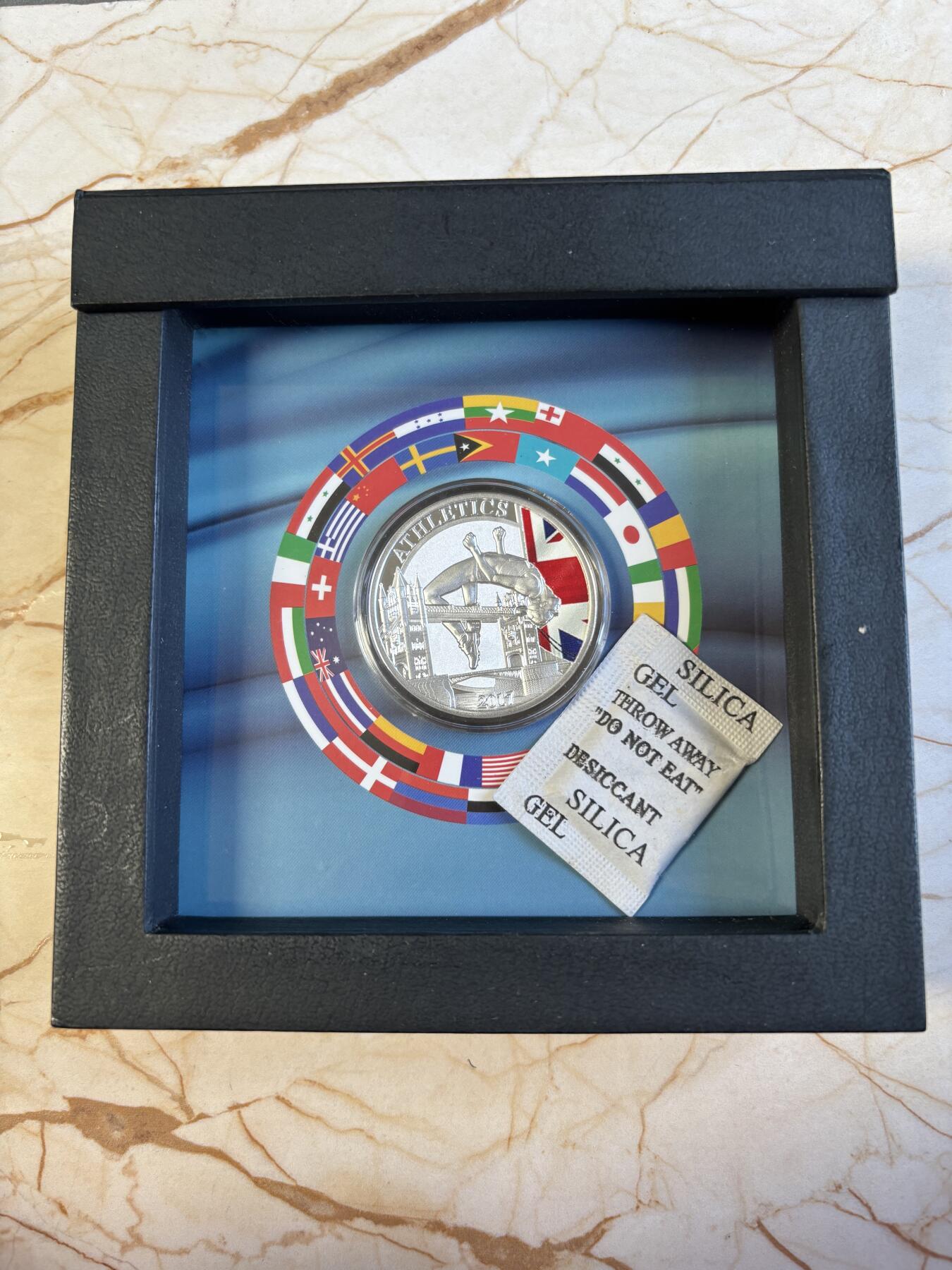 第197期拍卖 纽埃2017年1元彩色精制银币 2017年伦敦田径冠军赛 17.5克999银 发行量：999 盒证全