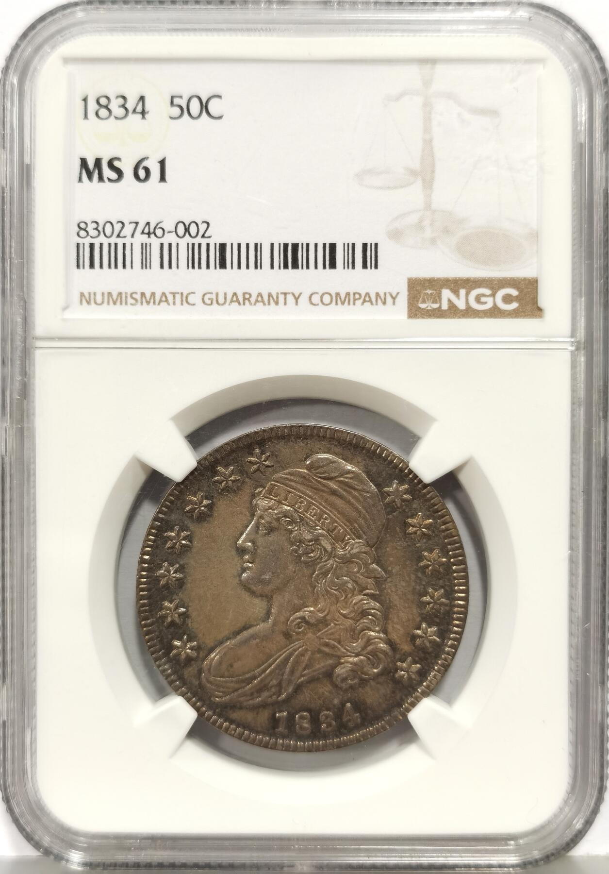 博洋堂世界钱币拍卖第168期（全场包邮） NGC MS61 美国1834 戴帽自由女神 50美分 麦稀奇首拍稀有品种 中国市场极其稀有 通体均匀黑包浆 打制精美 转光犀利 一步到位