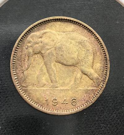 外国优质老铜币纪念币银币专场，周六晚上九点倒数截拍，满百包邮，节前出差在外，5月3日统一发货,可寄存半年，喜欢朋友微信扫描二维码可直接参拍 - 比属刚果1946年大象1法郎铜币。二战后比利时为巩固在中非的殖民统治发行，币面大象象征刚果自然资源，是比属刚果殖民时期的基础流通辅币，见证了战后刚果地区的货币与殖民历史。