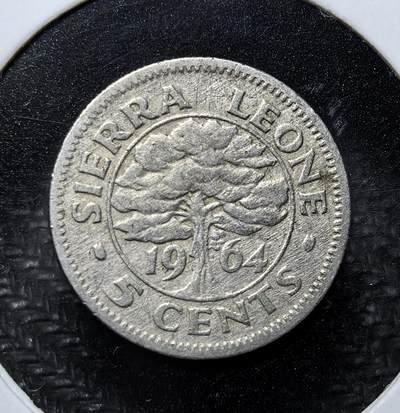 外国优质老铜币纪念币银币专场，周六晚上九点倒数截拍，满百包邮，周日发货,可寄存半年，喜欢朋友微信扫描二维码可直接参拍 - 塞拉利昂1964年木棉国树5分，币面铸国树木棉树图案，正面环绕英文面值。它见证了塞拉利昂独立初期的货币体系，承载着国家独立后的主权象征与自然文化符号，是战后非洲货币独立的实物见证。