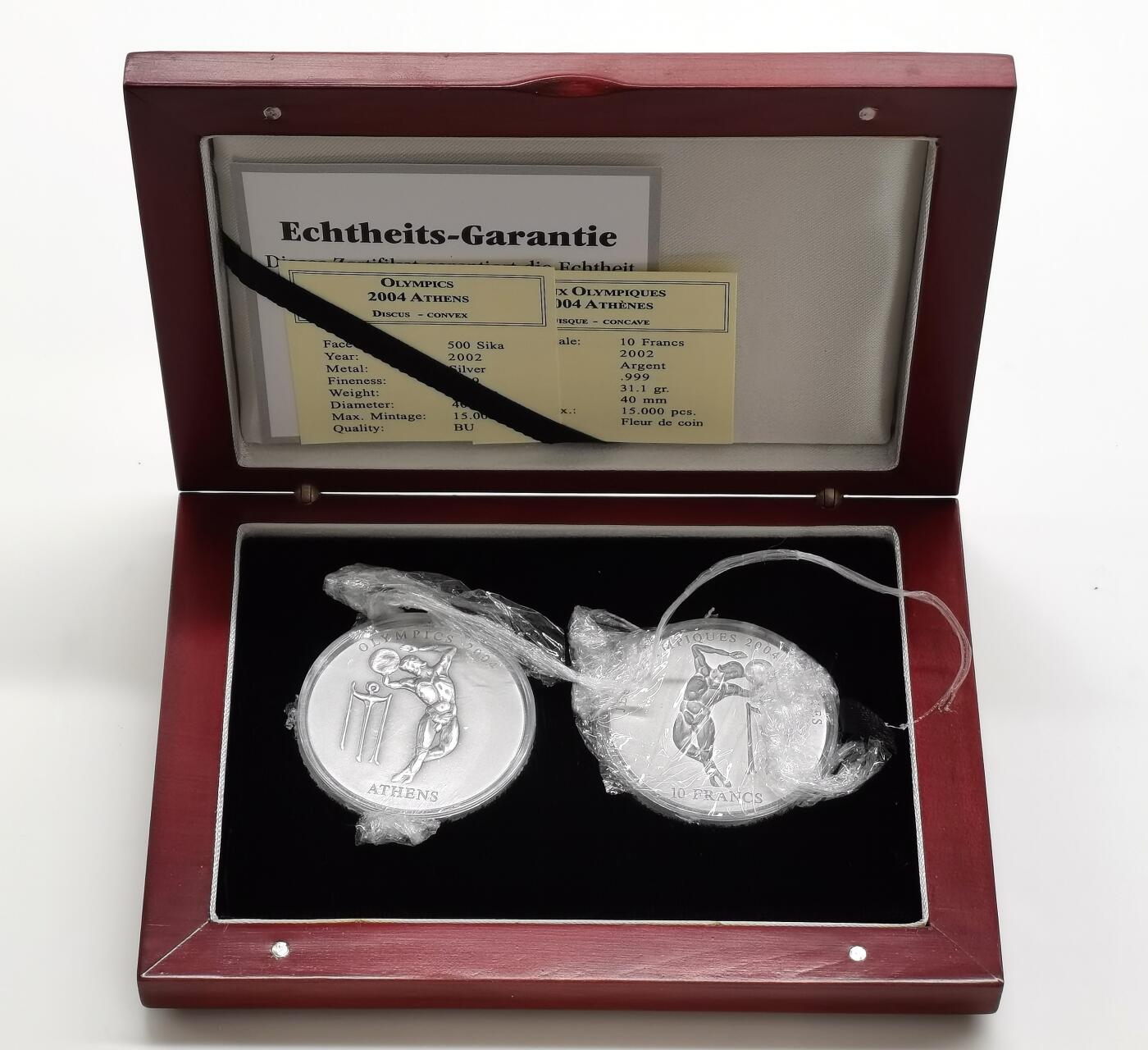 博洋堂世界钱币拍卖第168期（全场包邮） 刚果和加纳联合发行2002年10法郎和500塞地凹凸普制银币套 2004雅典奥运会系列-掷铁饼 2X1盎司999银 盒证全
