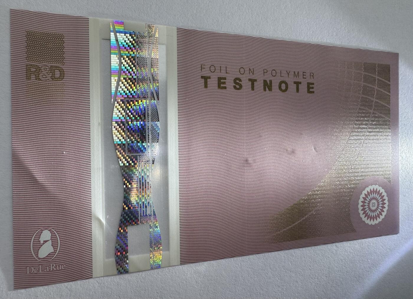 2026第7场（总第234期）：精品外钞、塑料钞、测试钞综合场  德纳罗DLR “全息资格测试”Safeguard基材塑料测试钞AUNC（有浅压痕）