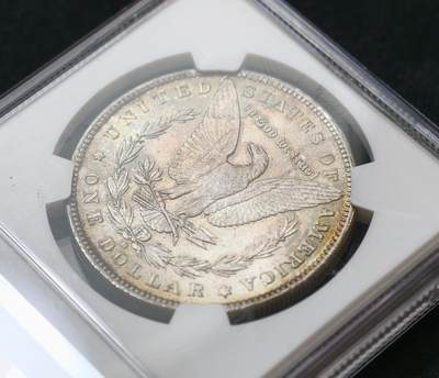 甄臻铺-世界币章拍卖（第60期），甄品场拍品征集中，送拍享返佣金等优惠多多 NGC-MS63 1883年O版美国摩根，少见年份，五彩包浆很耀眼