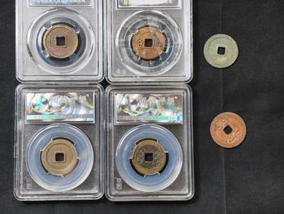 甄臻铺-世界币章拍卖（第60期），甄品场拍品征集中，送拍享返佣金等优惠多多 铜钱一组，其中一枚朱砂乾隆好状态