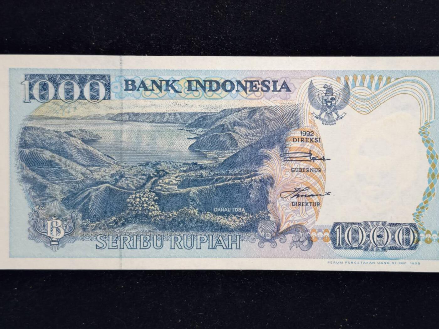 凯旋世界勋赏（第23期）（欢迎送拍）（对拍品有疑问请询问客服，不接受到手刀，出价默认拍品品相。请认真阅读拍卖规则！出价默认已认可！）（收到货请录制开箱视频，无视频概不处理问题。） 印尼1000卢比纸币