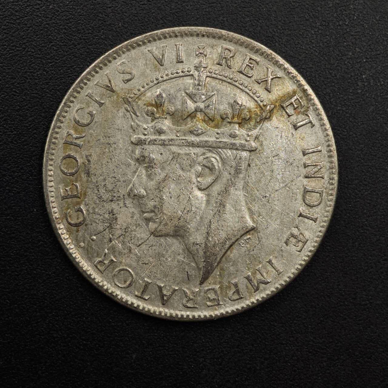 【淘币小摊】实时拍第八百九十二拍   散币场    每周一统一发货 英属东非1942年乔治六世1先令银币