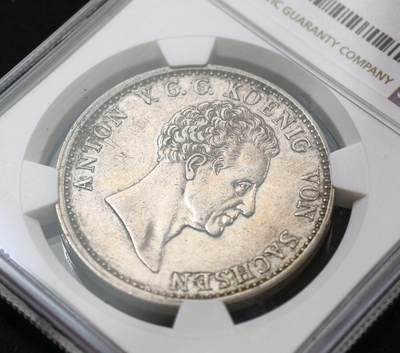 甄臻铺-世界币章拍卖（第60期），甄品场拍品征集中，送拍享返佣金等优惠多多 NGC-AUD 1828年德国萨克森安东尼一世费因马克泰勒银币 早期大尺寸泰勒 少见的摩尔人版本 比后期的少很多