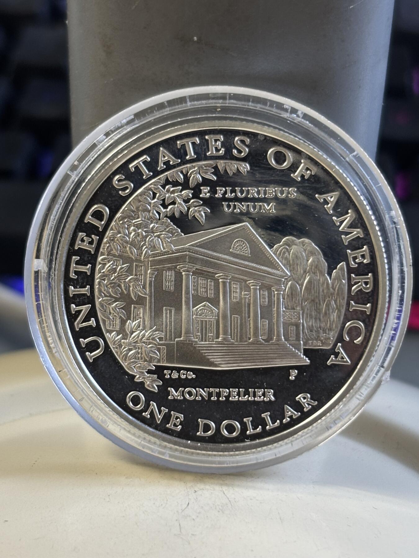 第197期拍卖 获奖美国1999年麦迪逊总统夫人多莉纪念银币，900银，26.72克，有瑕疵