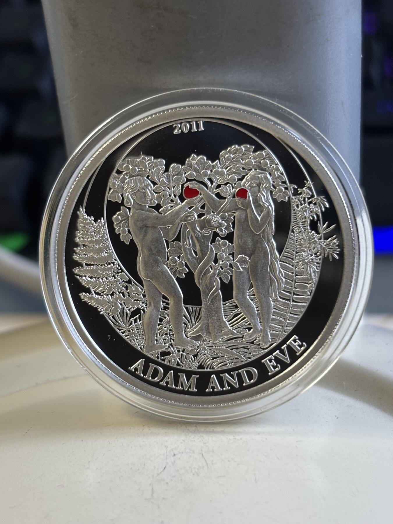 第197期拍卖 帕劳2011年故事系列亚当和夏娃半盎司精制纪念银币带证书，925银，15.5克，发行1000枚