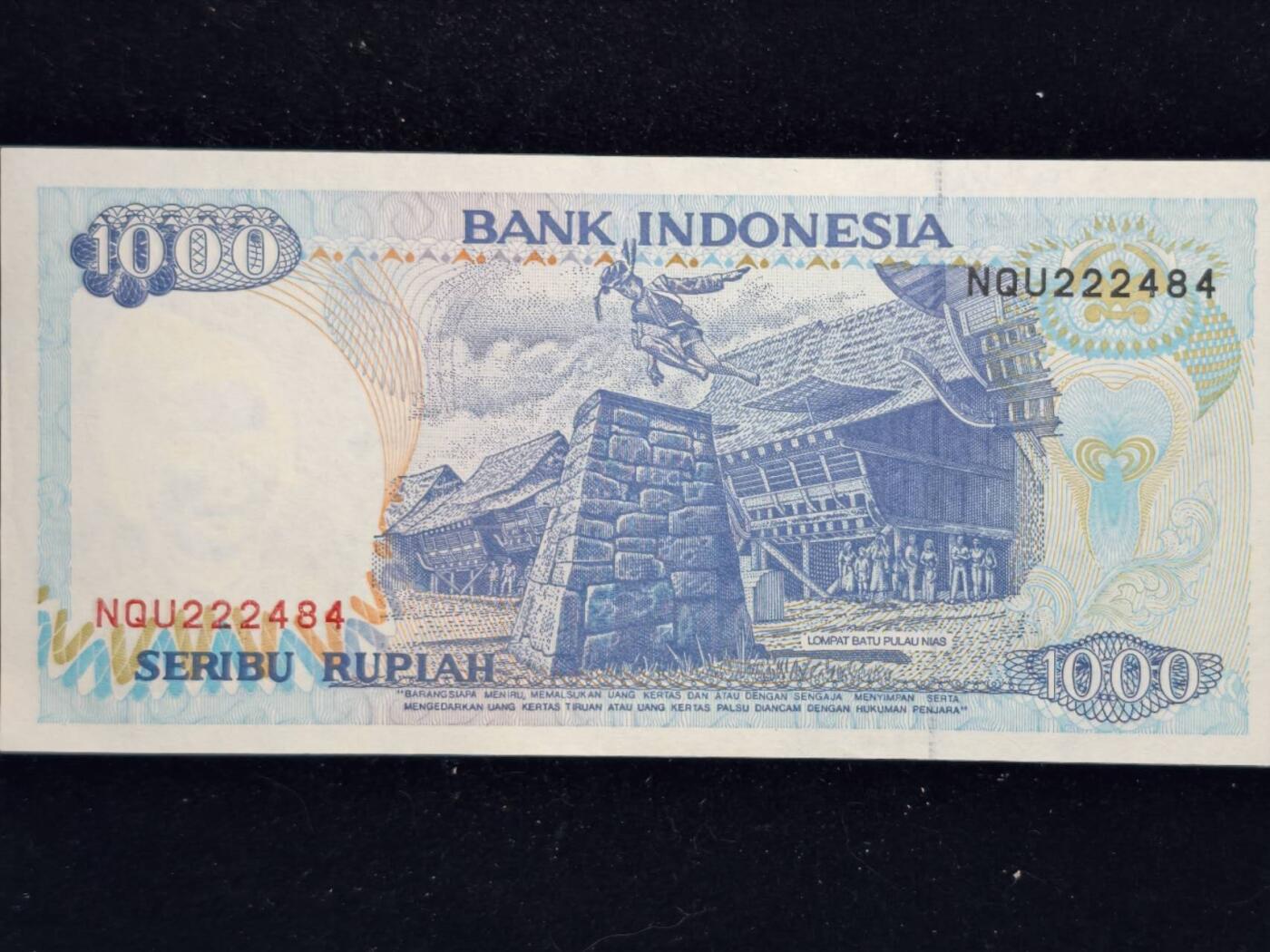 凯旋世界勋赏（第23期）（欢迎送拍）（对拍品有疑问请询问客服，不接受到手刀，出价默认拍品品相。请认真阅读拍卖规则！出价默认已认可！）（收到货请录制开箱视频，无视频概不处理问题。） 印尼1000卢比纸币