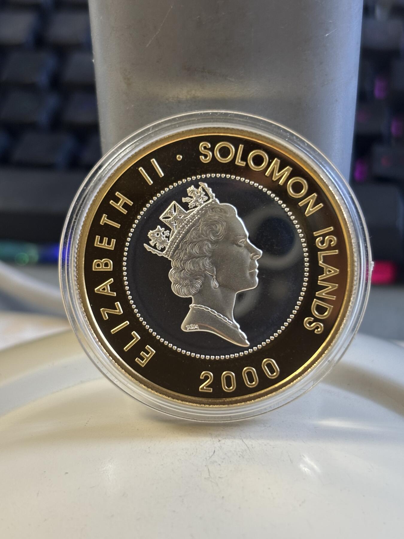 第197期拍卖 所罗门群岛2000年女王视察轰炸后的伦敦镀金银币28.28克，925银，银价491