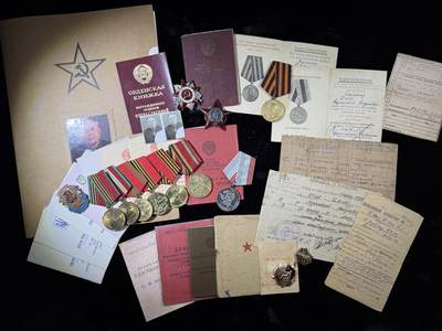 戎马世界章牌大赏第115期 苏联近卫军列兵套章，包括红星勋章，85版二级卫国战争勋章，战胜德国与一系列周年章，得主还获得过解放贝尔格莱德，只有证书了，红星事迹为得主带领工兵冒着炮火扑灭桥梁大火并且移走爆炸物，档案已经整理打印