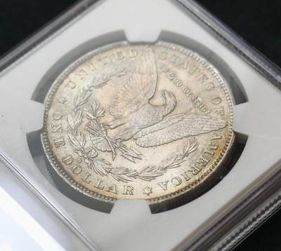 甄臻铺-世界币章拍卖（第60期），甄品场拍品征集中，送拍享返佣金等优惠多多 NGC-MS63 1883年O版美国摩根，少见年份，五彩包浆很耀眼