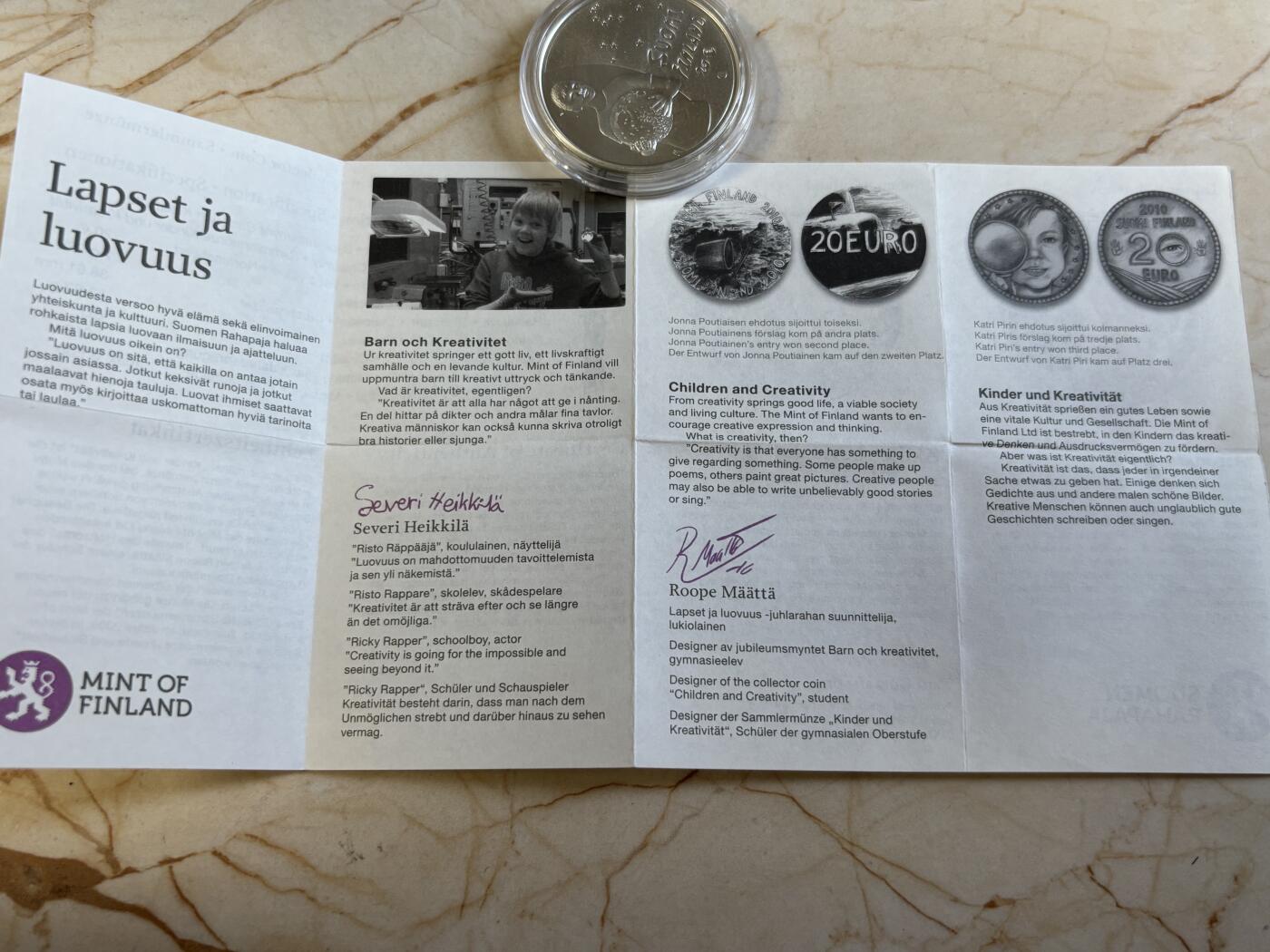 第197期拍卖 获奖币芬兰2010年儿童与创造力彩色精制纪念银币，925银，33.62克，发行10000枚，获得克劳斯2012年度最富激情币大奖