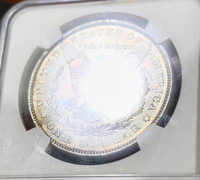 甄臻铺-世界币章拍卖（第60期），甄品场拍品征集中，送拍享返佣金等优惠多多 NGC-MS63 1883年O版美国摩根，少见年份，五彩包浆很耀眼