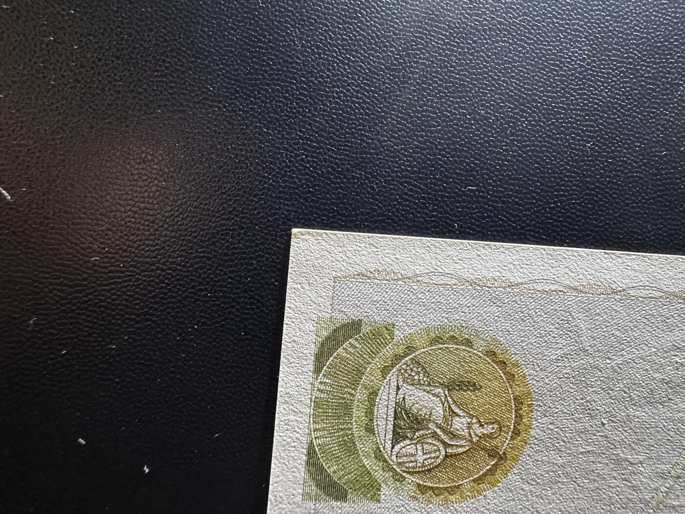 《外钞收藏家》第六百二十八期（精品百拍场）（长期征集拍品、欢迎藏友们联系合作） 英国D序列50镑 全新角不绝