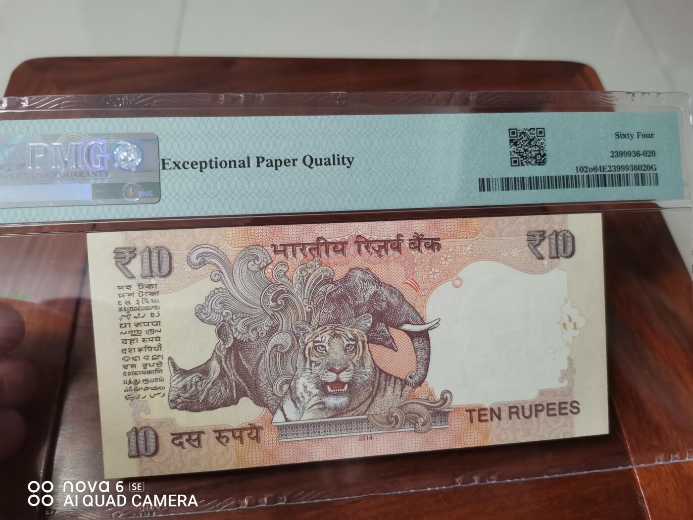 2014年 印度储备银行10卢比纸币，PMG评级64分，Choice Uncirculated，全同号79C 222222，Letter A版。票面保存完好，几乎全新，收藏级别，品相漂亮，适合钱币收藏爱好者。  评级币，保真包老，非流通外币，收藏价值高。评级机构为PMG，编号2399936902G。  包邮，同城可自提。售出不退不换，不议价。