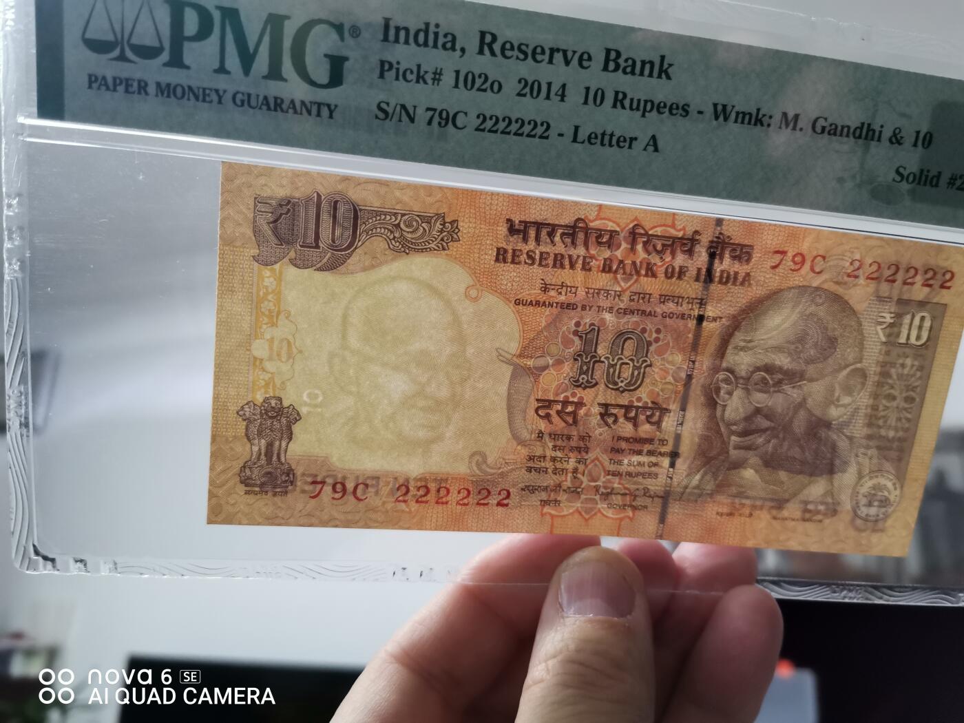 2014年 印度储备银行10卢比纸币，PMG评级64分，Choice Uncirculated，全同号79C 222222，Letter A版。票面保存完好，几乎全新，收藏级别，品相漂亮，适合钱币收藏爱好者。  评级币，保真包老，非流通外币，收藏价值高。评级机构为PMG，编号2399936902G。  包邮，同城可自提。售出不退不换，不议价。