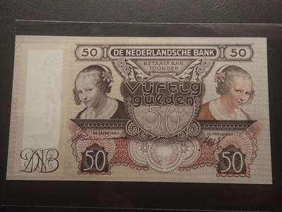 2026四月第三期，总第224期 荷兰1941版50盾AUNC 小女孩的对印肖像