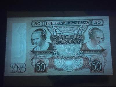 2026四月第三期，总第224期 荷兰1941版50盾AUNC 小女孩的对印肖像