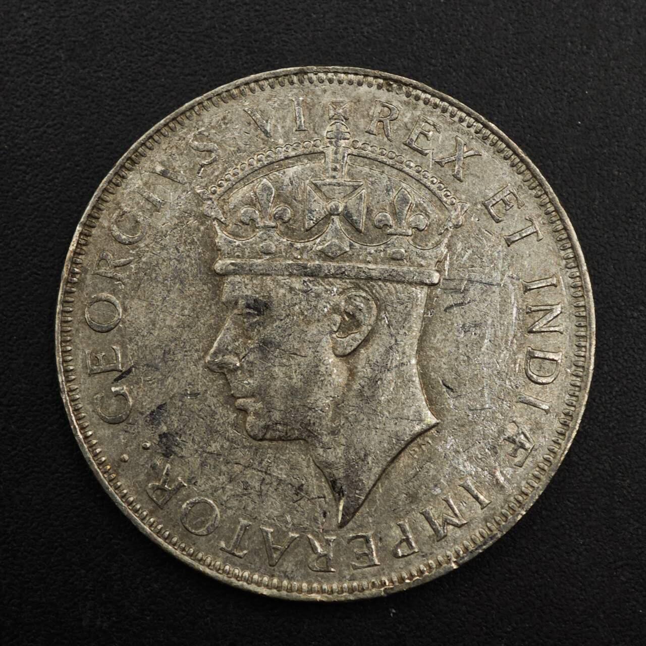 【淘币小摊】实时拍第八百九十三拍   散币场    每周一统一发货 英属东非1942年乔治六世一先令银币